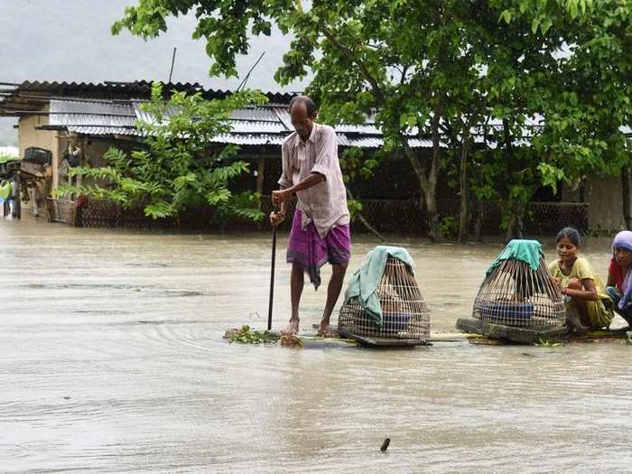 People trying to escape the deluge as water takes over Morigaon.