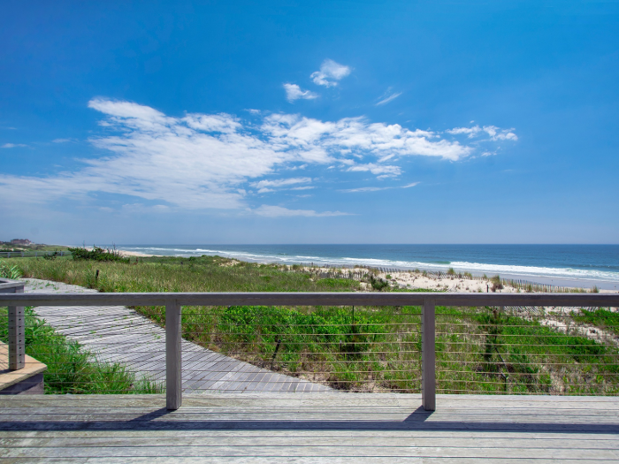 The home boasts 700 square feet of oceanfront property and three private walkways to the beach.