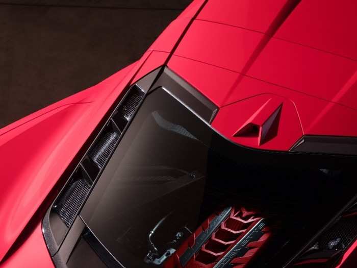 "A lightweight ... glass panel on the rear hatch allows owners to show off the engine," Chevy said. "This panel features a cantilevered trailing edge to evacuate heat from the engine compartment."