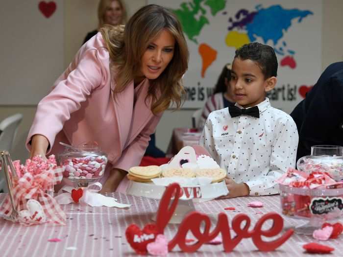 The first lady showed off her softer side for her second annual solo visit with sick children for Valentine