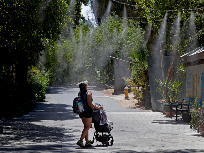 The Phoenix Zoo is keeping its patrons cool by spraying mist.