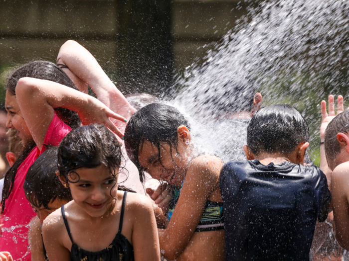 Back on July 2, in Chicago, kids cooled down by taking a dip in the Crown Fountain, in Millennium Park.