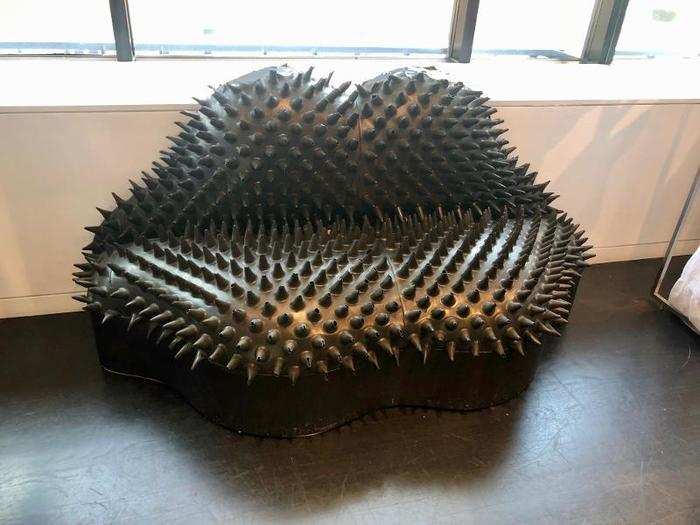 On another floor, we found this lips-shaped loveseat with ribber spikes protruding from the surface.