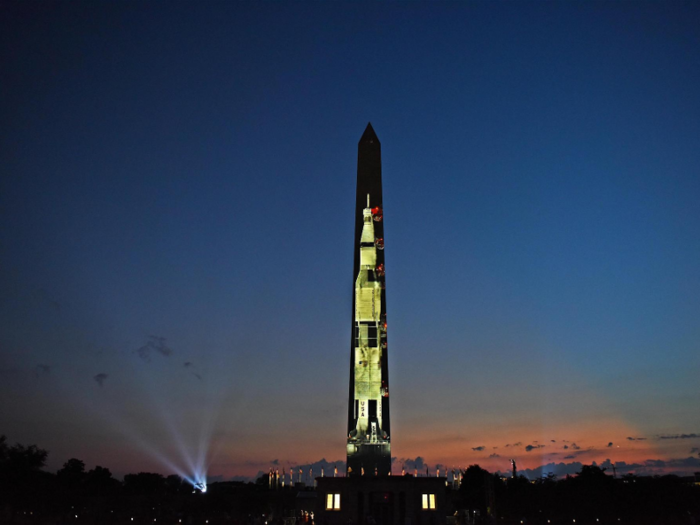 During the week, passersby could spot a still image of the Saturn V rocket in advance of the video showing on Friday and Saturday.