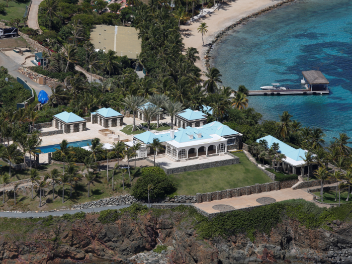 The main residence and compound sit on the northeast point of the island, and a pair of guest houses sit on the northwest and southeast points of the island. The mansion has a distinctive turquoise roof.