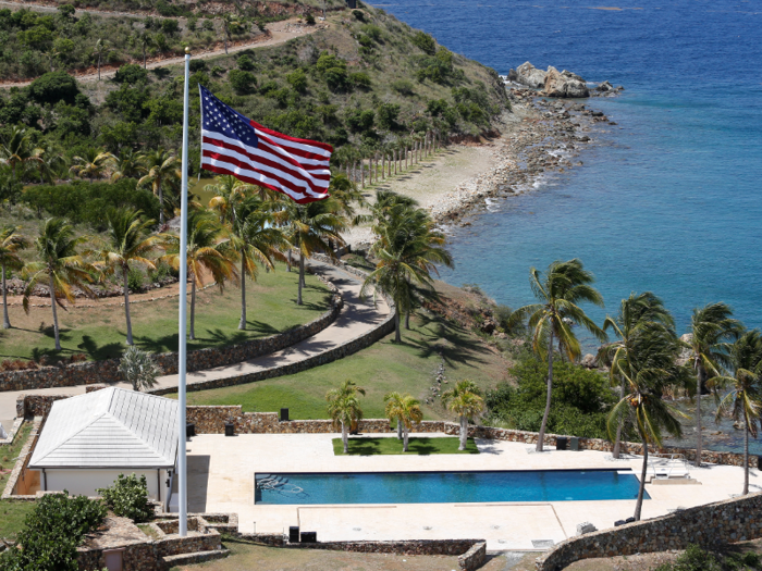 The island includes five buildings: a villa-style compound, a library, a cinema, a detached bathhouse, and cabanas. According to New York Magazine, there is also a “flamingo-stocked lagoon” on the island.