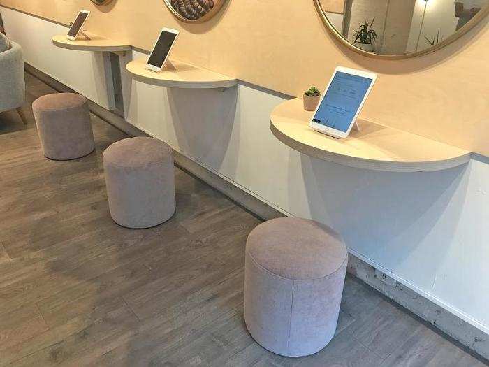 Near the lounge, there are stations outfitted with iPads for shoppers to access the Fit Finder survey, a short questionnaire that uses a proprietary algorithm to determine sizing.