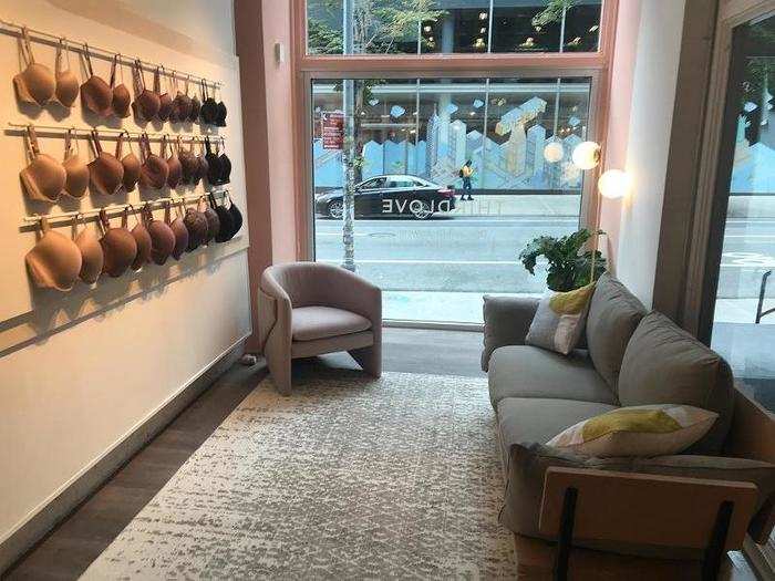 The store — which was designed by the same architecture team that designed the female co-working space, The Wing — is filled with soft lighting and warm colors.