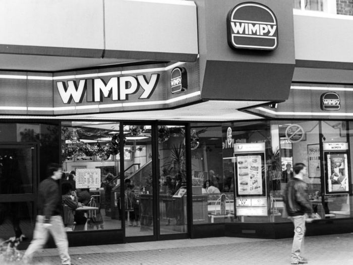 WIMPY — This burger chain inspired by "Popeye" character J. Wellington Wimpy had a brief and feeble existence in the US, reaching 26 US locations before dying with its founder in 1977. But even though Wimpy never truly found its place in America, it traveled around the globe, opening in India, Israel, and Europe. Now, it