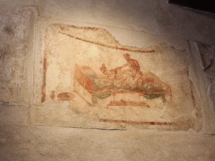 Frescos depicting erotic scenes are still clearly visible on the walls.