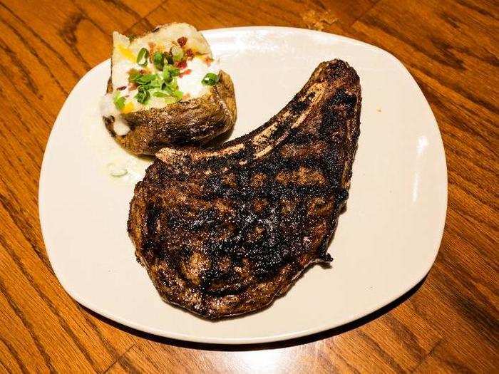 It was time for the main event at Outback: a 24-ounce bone-in ribeye cooked medium-rare.