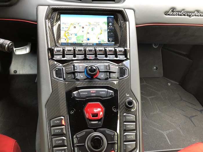 The modest, Audi-derived infotainment screen sits atop the center console. It