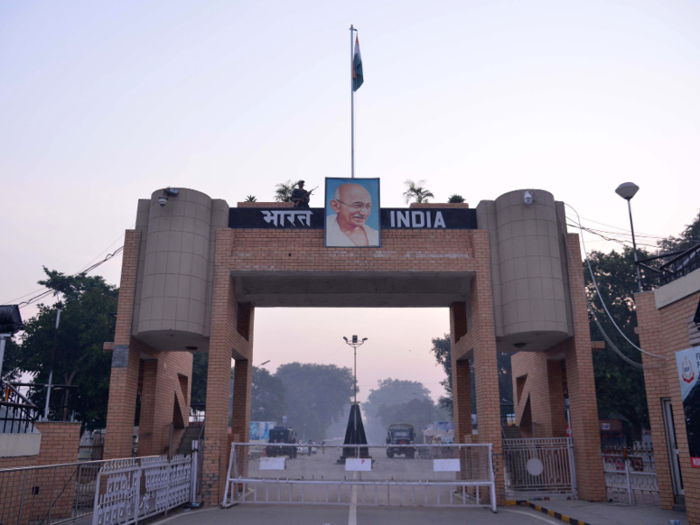 The entrance to India features Mahatma Gandhi. Gandhi led the push for Indian independence from colonial Britain through peaceful resistance, including a hunger strike and what