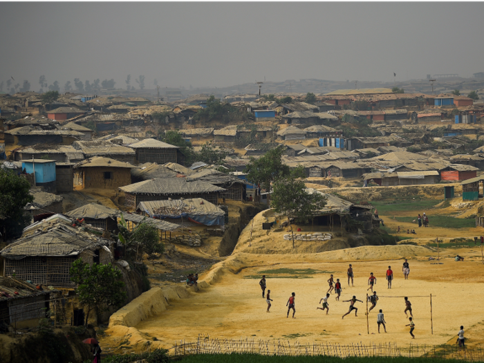 In the camps, life carries on as best it can. People play soccer.