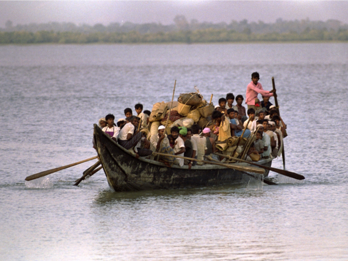 One of the key routes refugees took to get into Bangladesh from Myanmar was over the Naf River. Seen here is a group crossing the river in 1992.