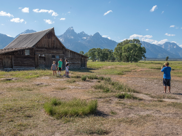 As the two groups left, another family showed up and posed for photos in front of the barn.