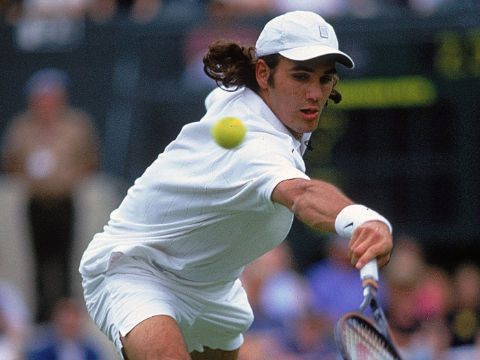 At 14, Federer became the national junior champion in Switzerland. He joined the junior tennis circuit in 1996, and won the junior Wimbledon title in 1998. In this photo, from Wimbledon 2000, he is 19 years old.