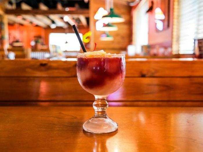 Texas Roadhouse had the most distinctive house margarita: the Sangria Margarita. It was kaleidoscopic red and blended to smooth perfection with a thick crust of salt on the rim.