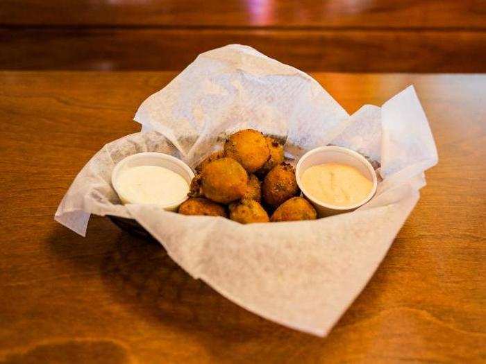 Texas Roadhouse is famous for its Rattlesnake Bites, which are deep-fried balls of pepperjack cheese and jalapeño bits.