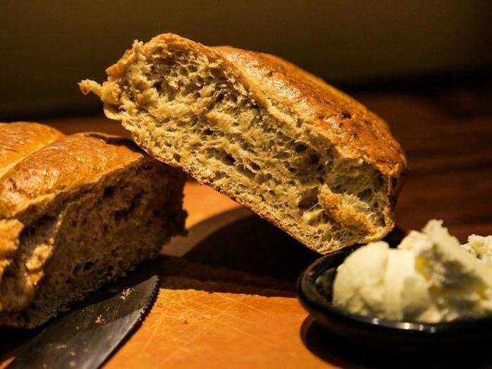 I was mildly peeved that I had to cut my bread with my heavy steak knife. It was hot and dense but doughy in the middle, and it crumpled under the weight of my knife.