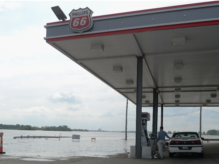 In June, barriers dividing the road from the Mississippi River in West Alton, Missouri, are no longer so clear.