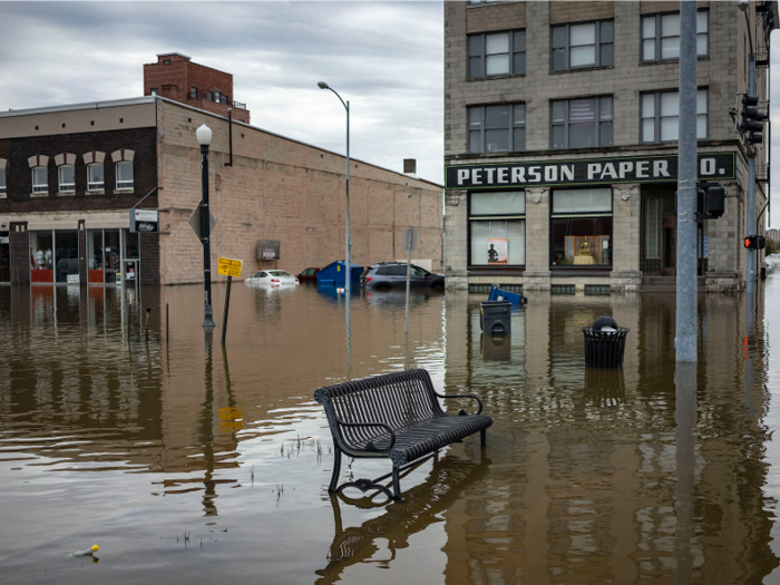 In May, water similarly covered the streets of Davenport, Iowa.