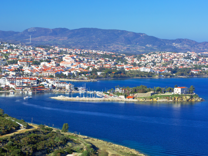 The 50-mile long peninsula is full of natural features — green hills, rocky boulders, olive groves, unspoiled beaches, and ravines.