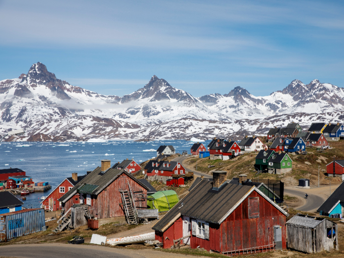 The melted ice ends up in our oceans, causing sea levels to rise. Rising sea levels causes flooding in coastal cities and towns, like this residential area in Greenland.