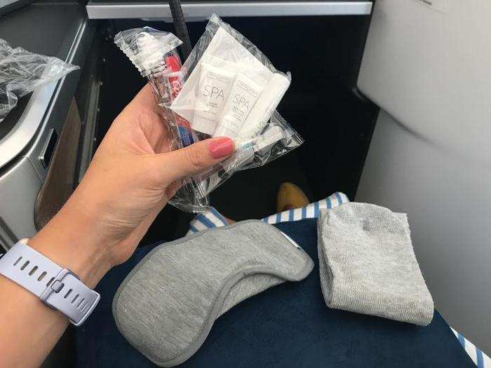 There was an eye mask, socks, toothbrush and paste, ear plugs, a pen, lip balm, moisturizer, and a relaxing pulse point roll-on. Passengers wouldn