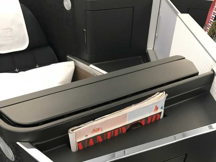 Cruz had told us the suites were designed with the small details in mind, and that was clear. There was a lot of storage space (apparently 40% more than before), such as this magazine holder where I placed my magazines and duly ignored them for the whole flight.