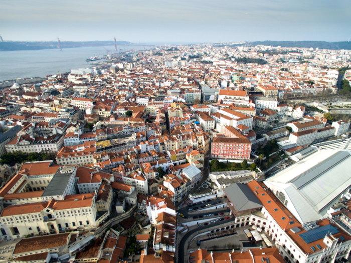 Catch the sunset and a drink or two at PARK, a rooftop bar atop a parking garage in the district of Bairro Alto.