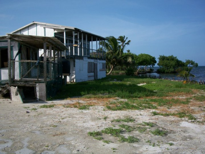 Together, the existing structures include nine bedrooms and 2.5 bathrooms. However, according to the listing website, they are in need of repairs.