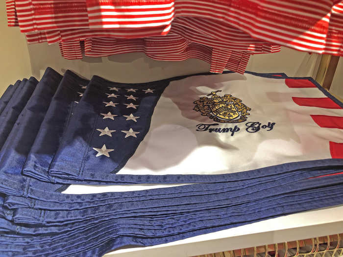 There were also golf accessories like this $55 flag featuring the coat of arms again ...