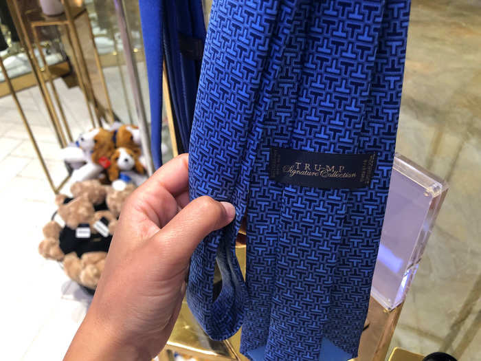 There were Trump Signature Collection neckties hanging in the window — when I got up close I could see the pattern was made of a series of mini "T" shapes.