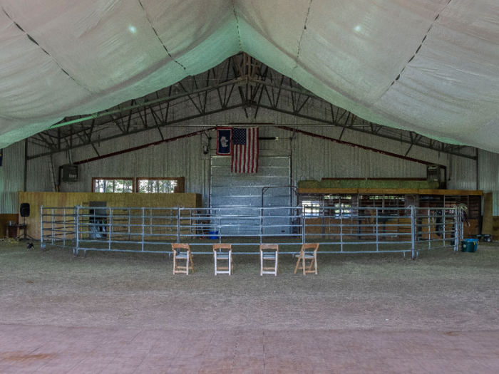 The demonstrations take place in a round arena set up on one side of the barn.