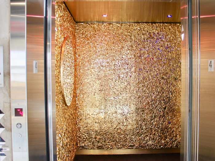 We were led into an elevator completely covered in gold material. The elevator was actually an art installation from Slytex Studios and the piece that we were standing in was called Gold Capsule.