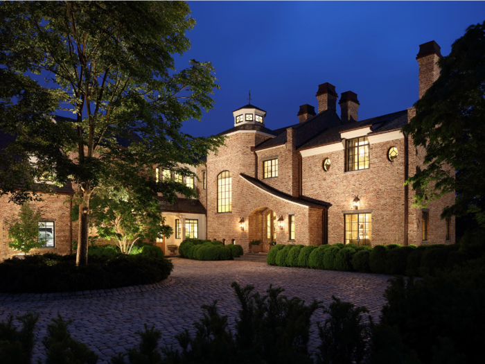 The stone driveway holds up to 20 cars, according to the listing.