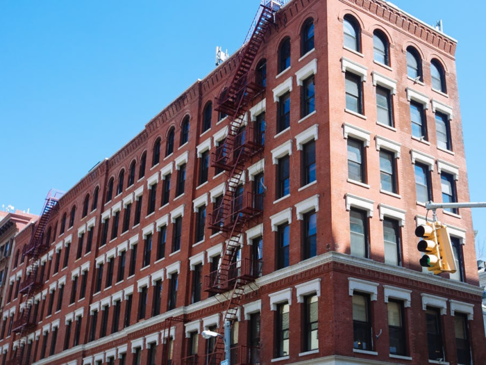 The first WeWork location was just 3,000 square feet in a tenement-style building in SoHo. It had creaky floorboards and exposed brick, which the founders power-washed clean.
