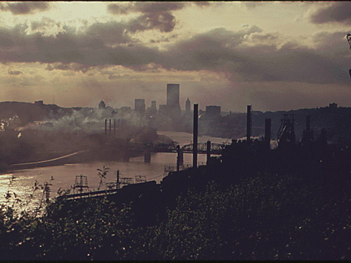 In Pittsburgh, which was once called "Hell with the lid off," thick smoke creates a haze over the city.