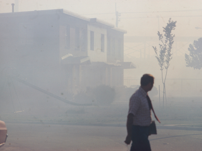 A house in North Birmingham is barely visible in industrial smog coming from the North Birmingham Pipe Plant. It was the most polluted area of the city.