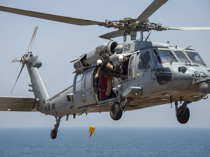 "The purpose of the bean-bag drop was to show timely pilot-to-ship communication can be done without electronic transition," said Lt. Cmdr. Michael Brown, the HSC-21 detachment officer in charge. "Together HSC-21 crew and Boxer demonstrated timely communication from the aircraft to the ship during EMCON [emissions control] procedures."