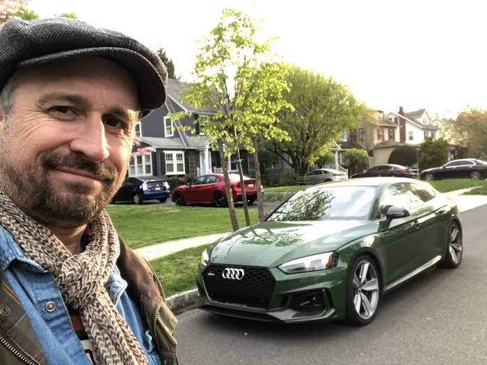 Speaking of Audi, how about we take a closer look at the Audi RS5 Sportback, in a show-stopping "Sonoma Green Metallic" paint job. Before many thousands of dollars in options, the car costs $74,200. As tested, it was $97,815.