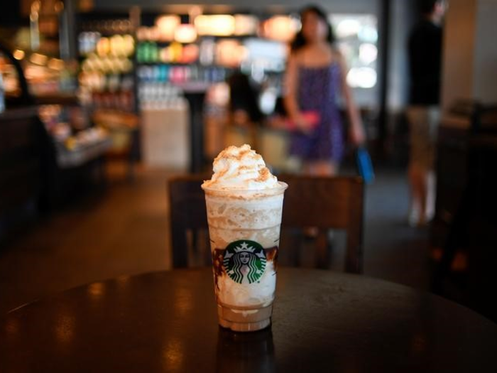 1994/1995 — FRAPPUCCINO, STARBUCKS: A portmanteau of the words "frappe" and "cappuccino," the Frappuccino is Starbucks