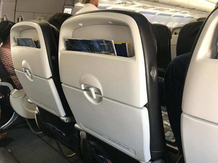 In Club Europe, it was useful to have both a magazine rack at the top of the chairs and a pocket lower down where you could put a water bottle — considering more and more budget airlines now have zero storage at all on the backs of the chairs, I appreciated this.