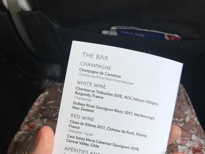 The drinks menu was pretty extensive too, featuring champagne, two white wines, two reds, a selection of spirits, and beers. I noticed that the drinks on offer were different from the ones available for purchase further back in the plane.