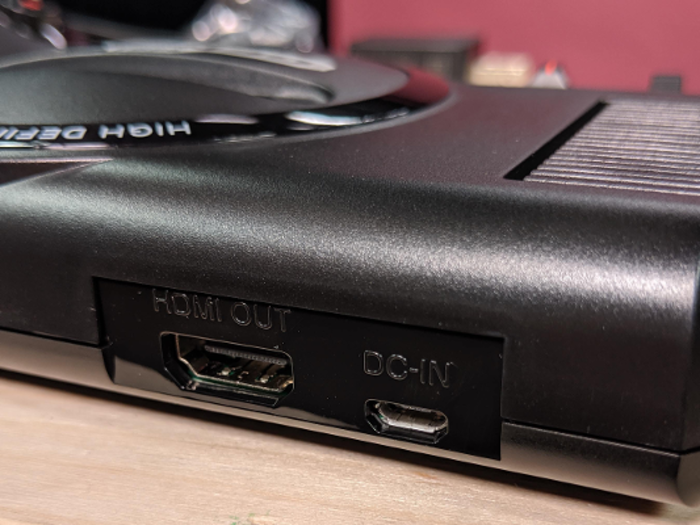 And in the back, the original ports are swapped for modern ones — DC power in and HDMI out: