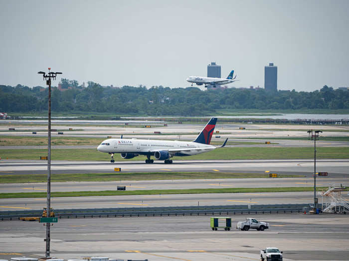 You can also get partial views of a few other runways — when I was at the hotel, 4L/22R was being used for take-offs, while the parallel runway — 4R/22L, just off in the distance — was receiving arrivals.