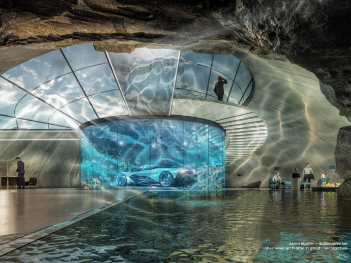 Obermoser arch-omo architecture firm has created a design concept, pictured below, that has living, entertainment, and leisure areas centered around the Aston Martin.