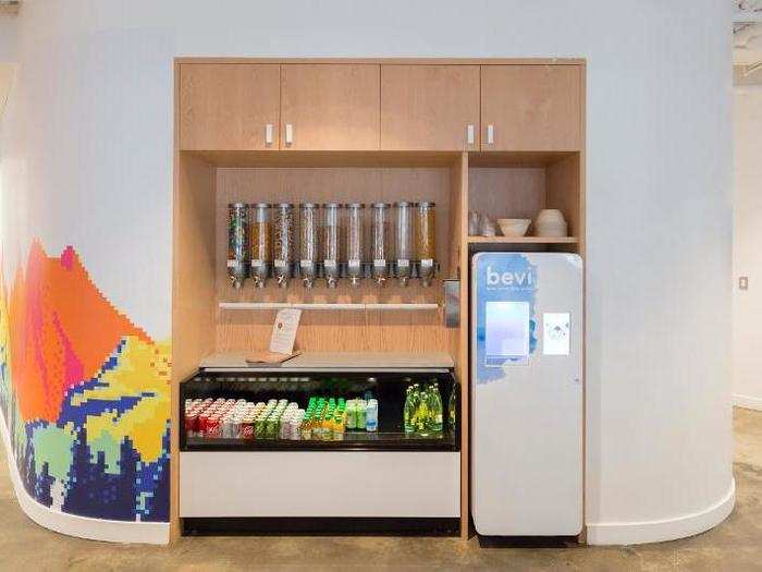 The all-hands space has a kitchen filled with bulk snacks, some cans of soft drinks, as well as a sparkling water machine.