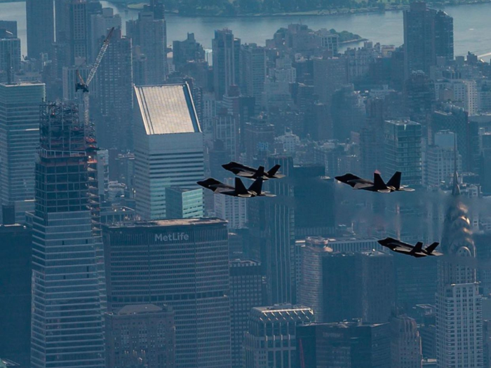 Jets from the F-22 Raptor demonstration team flew alongside the Red Arrows over New York City on August 22.